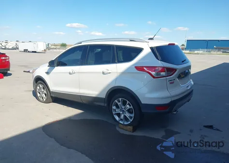 2015 Ford Escape Titanium z USA, uszkodzony, nr VIN 1FMCU9J91FUB44771